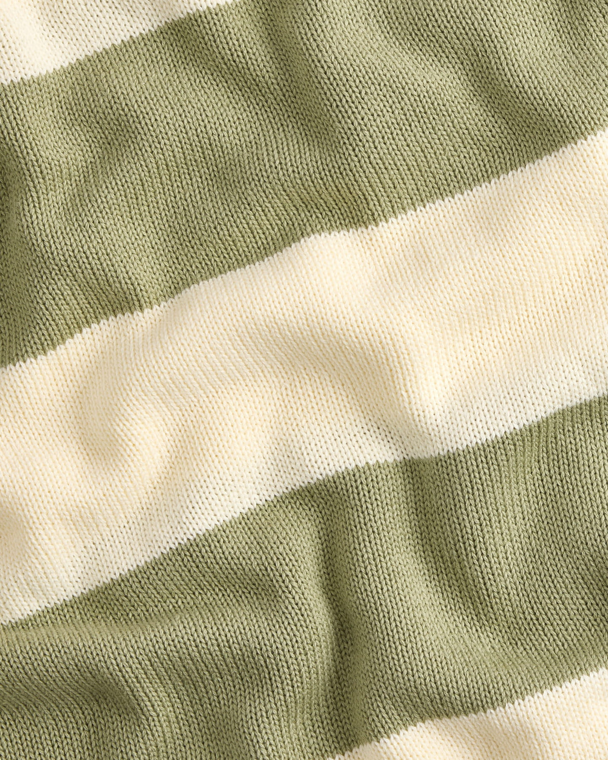Horizon baby blanket in sage green, close-up of the knit texture